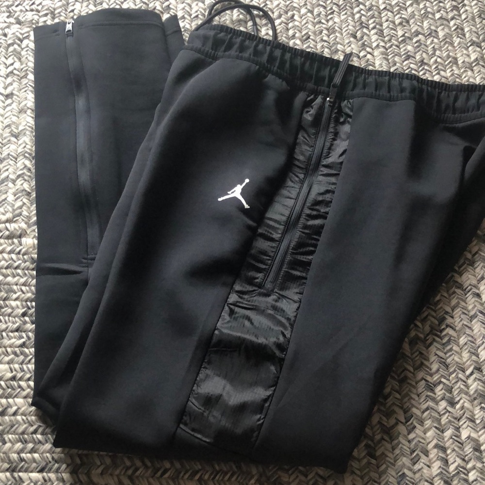 NWT Jordan pants. Zipper pockets. Various sizes